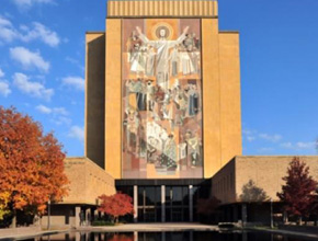 Photo of building with a blue sky behind